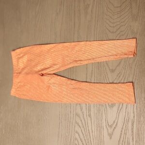 Girls sparkly orange leggings